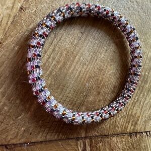 Chic Beaded Bracelet with Red, Gold, and Black Accents